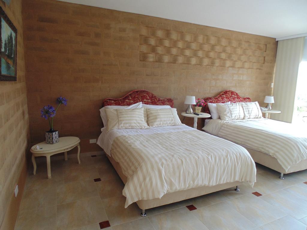 Bella Tierra Hotel Boutique Tibasosa Room photo
